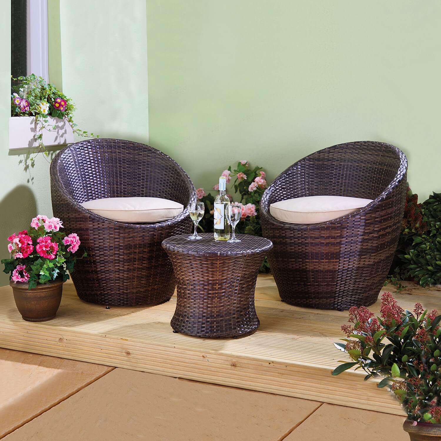 Pod Garden Table & Chair Set: traditional rattan look.